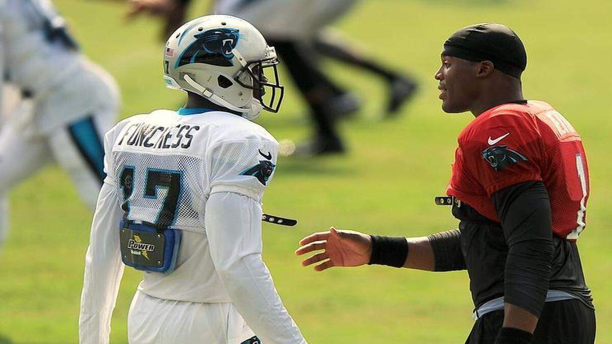 
Carolina Panthers wide receiver Devin Funchess, left, listens to quarterback Cam Newton, right, following a play during practice on Monday. Newton’s big-receiver options increased when the Panthers selected Funchess.

