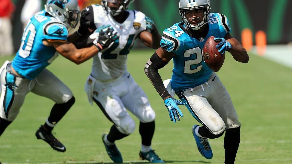
Carolina Panthers cornerback Josh Norman intercepts a pass by Jacksonville Jaguars quarterback Blake Bortles during the third quarter of Sunday’s game at EverBank Field in Jacksonville, Fla. Norman ran the interception back for a touchdown. The Panthers defeated the Jaguars 20-9.
