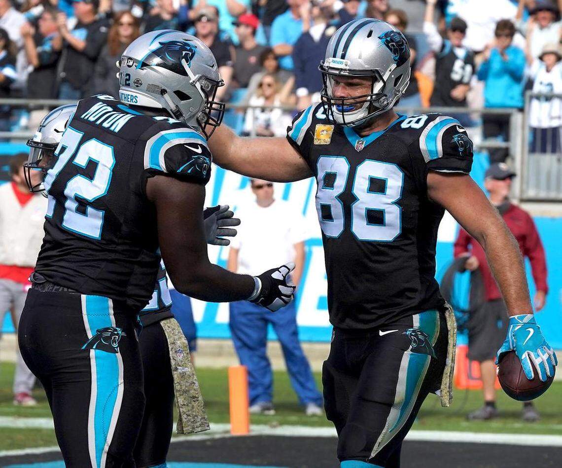 Carolina Panthers tight end Greg Olsen, right, hasn’t scored a touchdown since Week 9 against Tampa Bay. He’s might be due for a score on Sunday at Detroit.