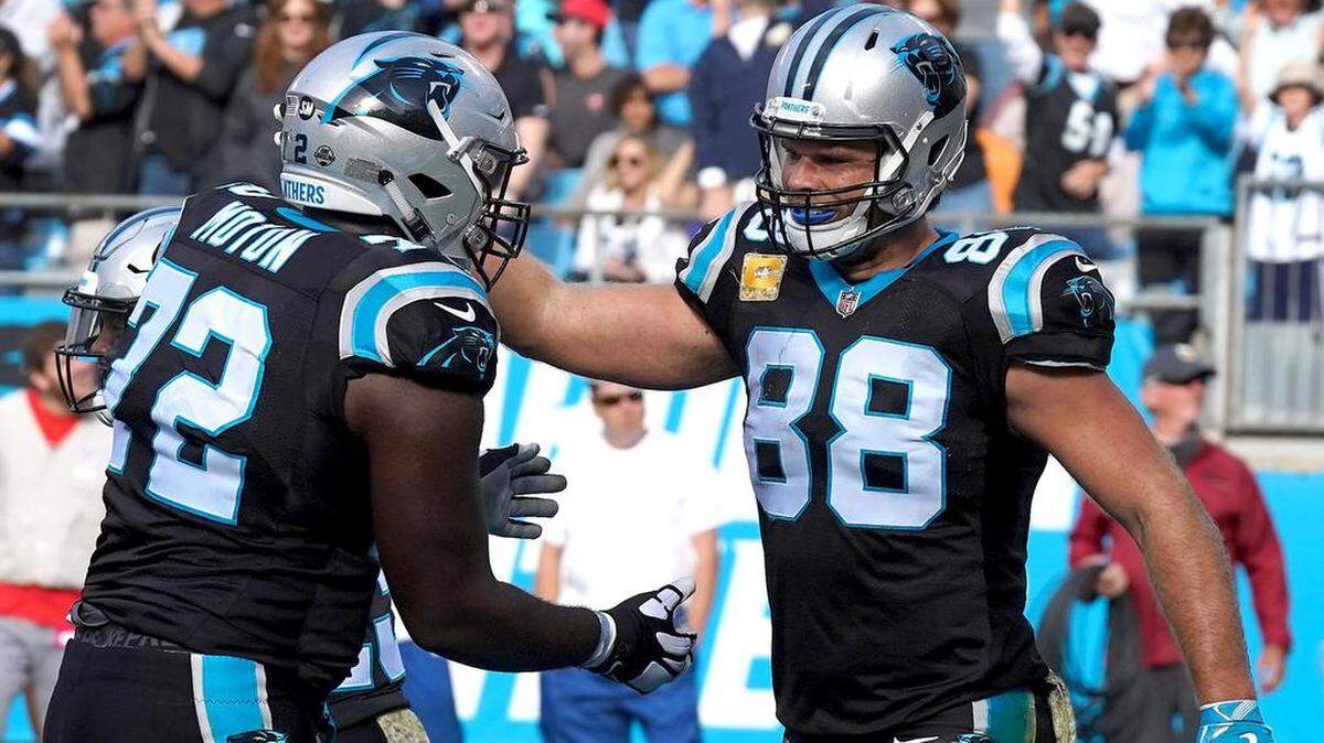 Carolina Panthers tight end Greg Olsen, right, hasn’t scored a touchdown since Week 9 against Tampa Bay. He’s might be due for a score on Sunday at Detroit.