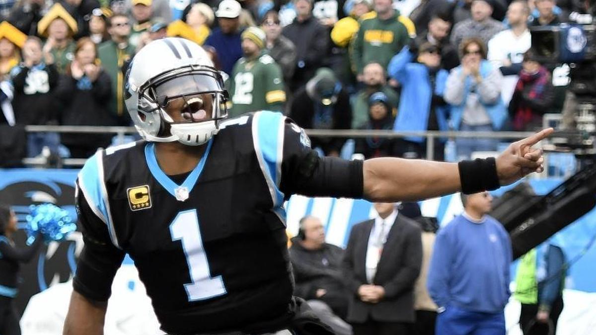 Carolina quarterback Cam Newton (1) threw four touchdown passes Sunday in Carolina’s 31-24 over Green Bay as the Panthers improved to 10-4.