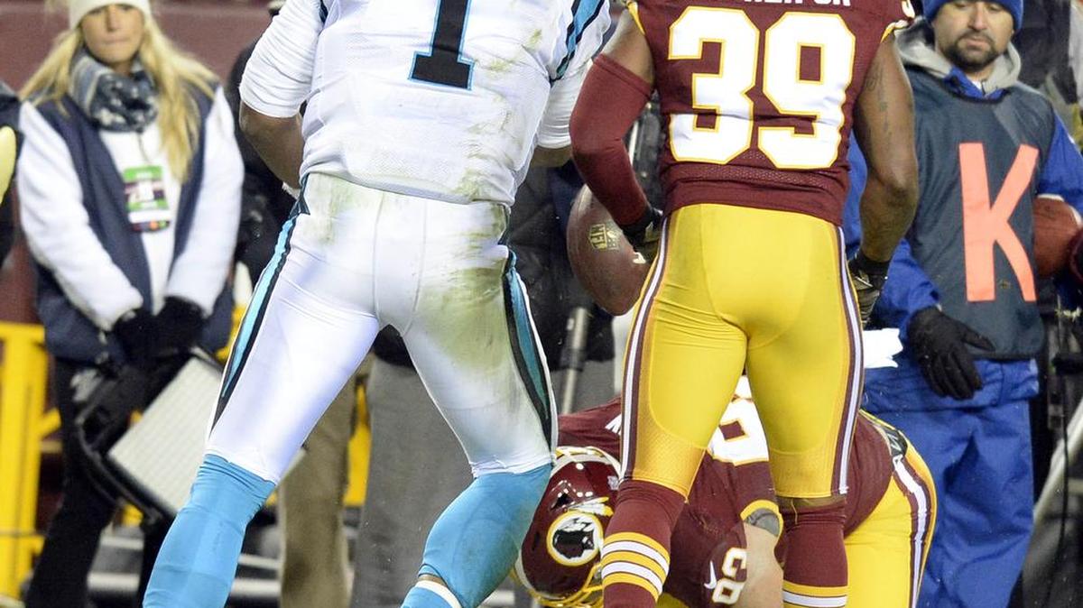 Panthers quarterback Cam Newton gets called for a penalty after throwing the ball at a Washington player after being chased out of bounds during Monday night’s game at FedExField.