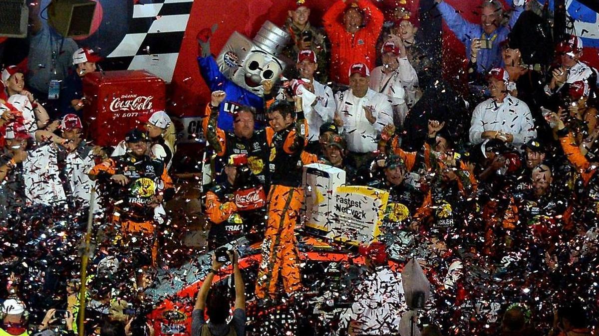 NASCAR Sprint Cup Series driver Martin Truex Jr. celebrates his victory in the Coca-Cola 600 at Charlotte Motor Speedway on Sunday, May 29, 2016.