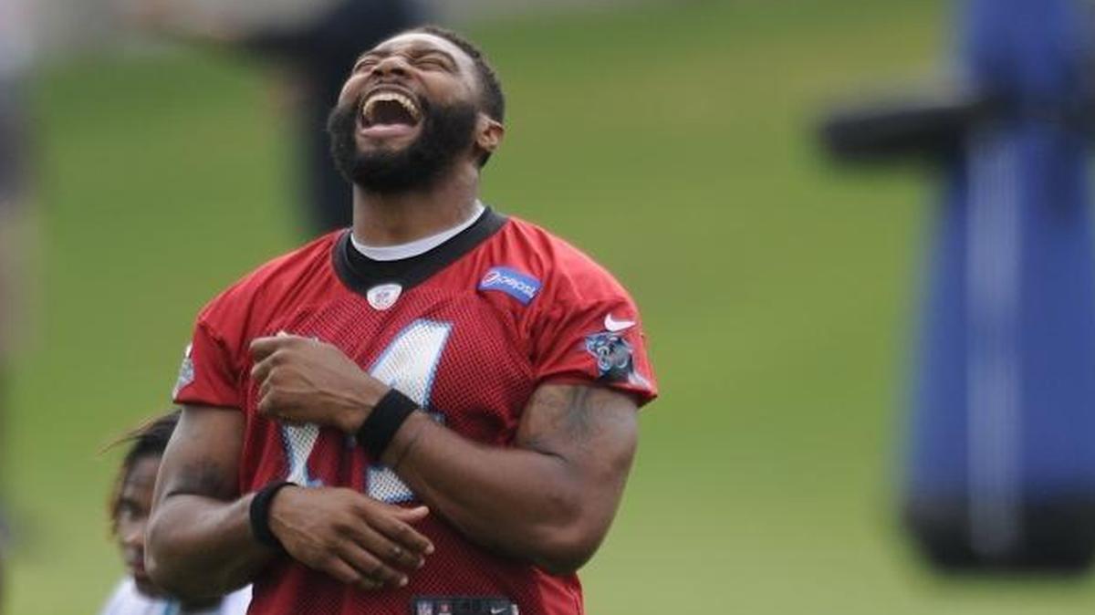 Carolina Panthers quarterback Joe Webb (14) sings along to the music during a practicce earlier this summer. The Panthers’ third-string quarterback, Webb keeps his spot on the roster primarily due to his versatility.