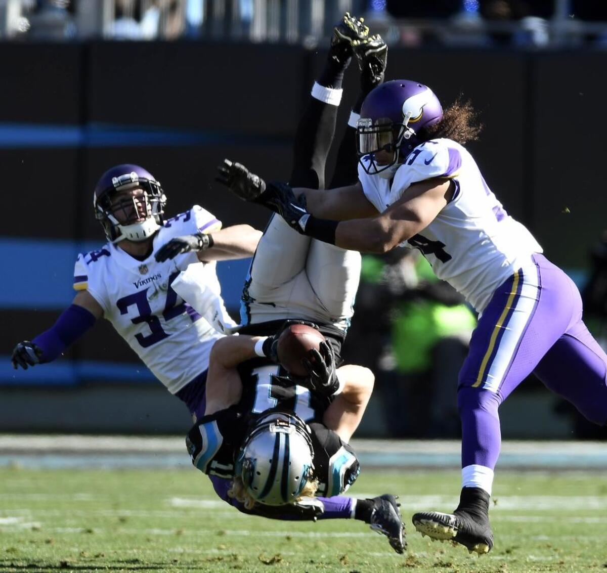 Carolina Panthers wide receiver Brenton Bersin (11) somehow did not hurt his neck or his head on this play, but did slightly injure his left big toe.