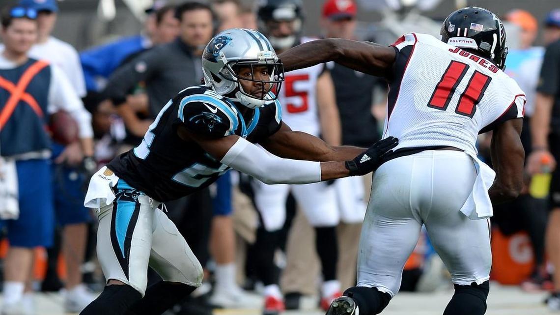 Carolina Panthers cornerback Josh Norman, left, held Atlanta Falcons wide receiver Julio Jones, right, to four catches for 33 yards – and disputes that one of those catches was on him – on Sunday. NBC’s Rodney Harrison was impressed – to a point.