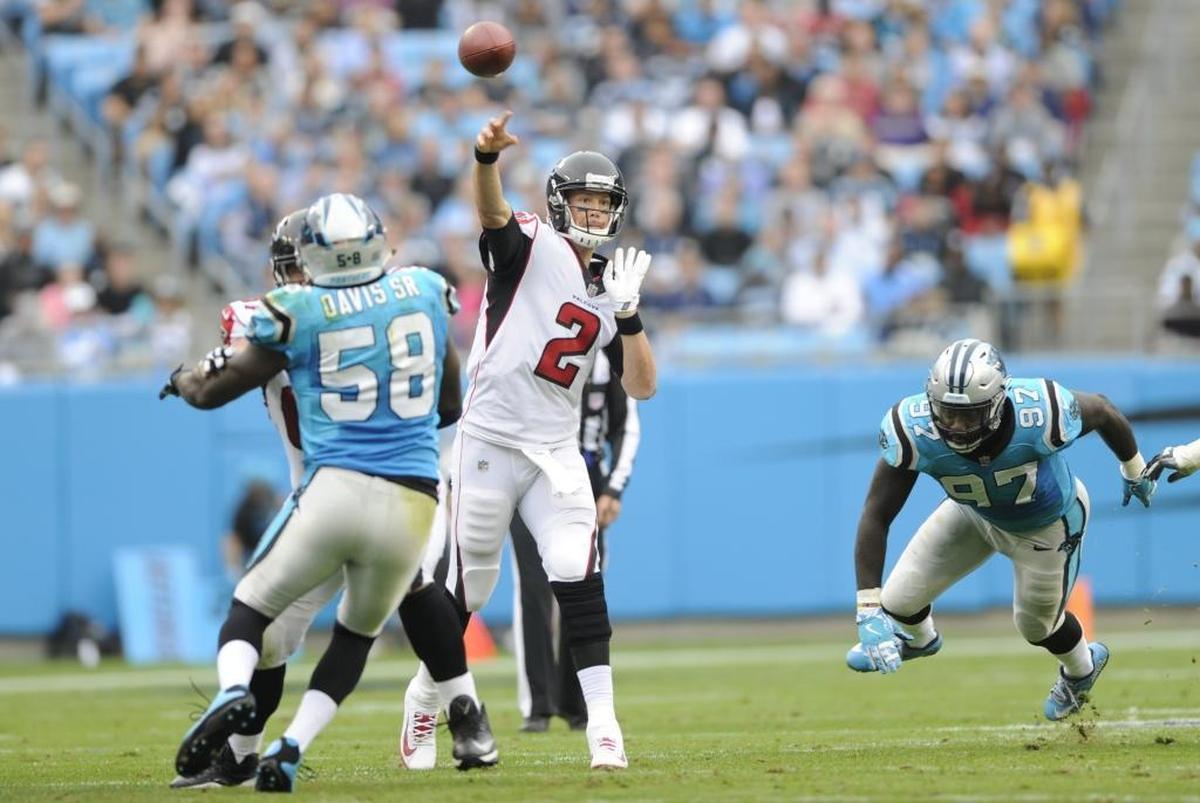 Atlanta’s Matt Ryan (2) throws a pass against Carolina Sunday. The Falcons entered the game having beaten Carolina three times in a row.