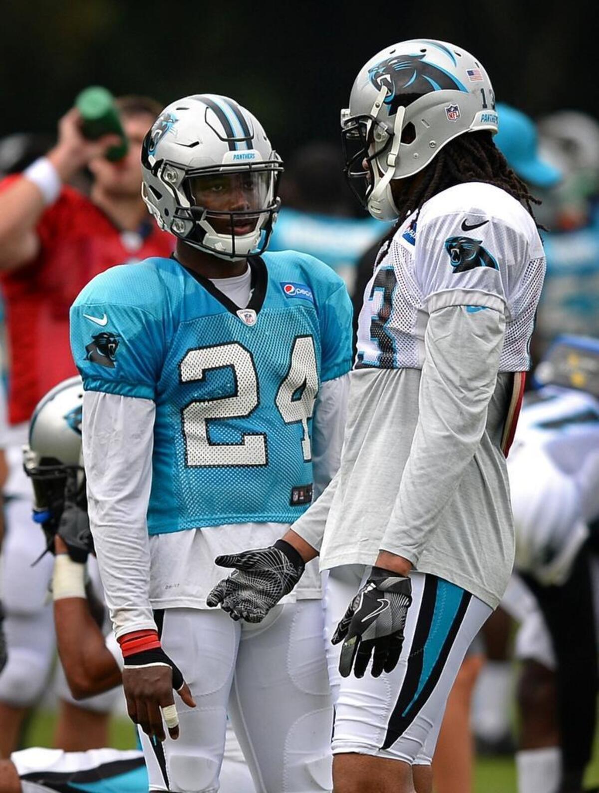 Carolina Panthers cornerback James Bradberry, left and wide receiver Kelvin Benjamin talk following a drill during practice in Spartanburg Friday. Bradberry said later that Benjamin was giving him a coverage tip.