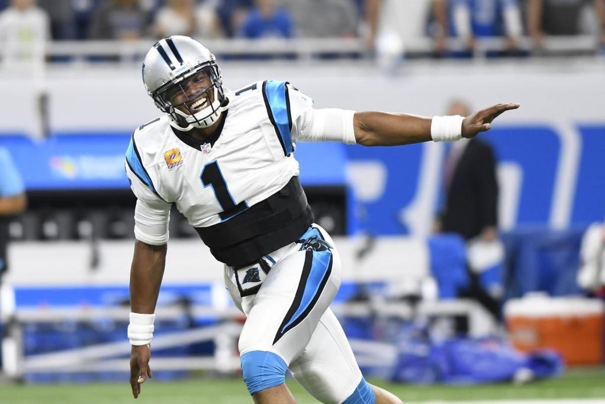 Carolina Panthers quarterback Cam Newton warms up before the game with Detroit Sunday.