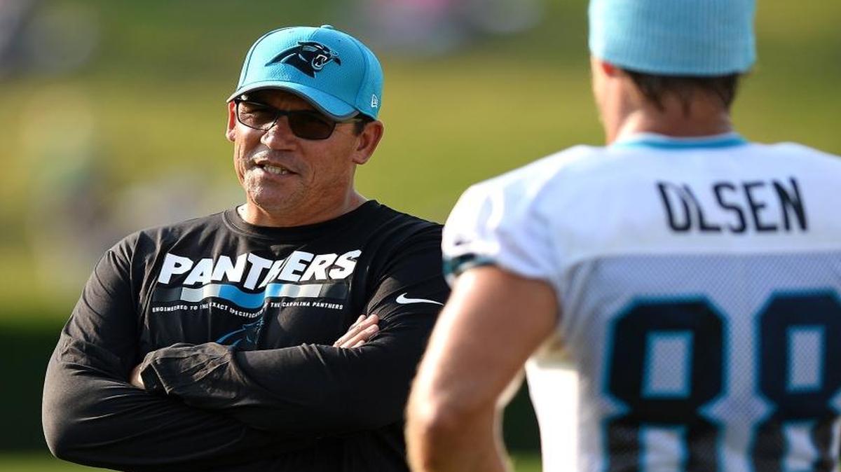 Carolina Panthers head coach Ron Rivera (left) and tight end Greg Olsen saw a nine-win drop in regular-season wins from 2015 to 2016, but will rebound this season.