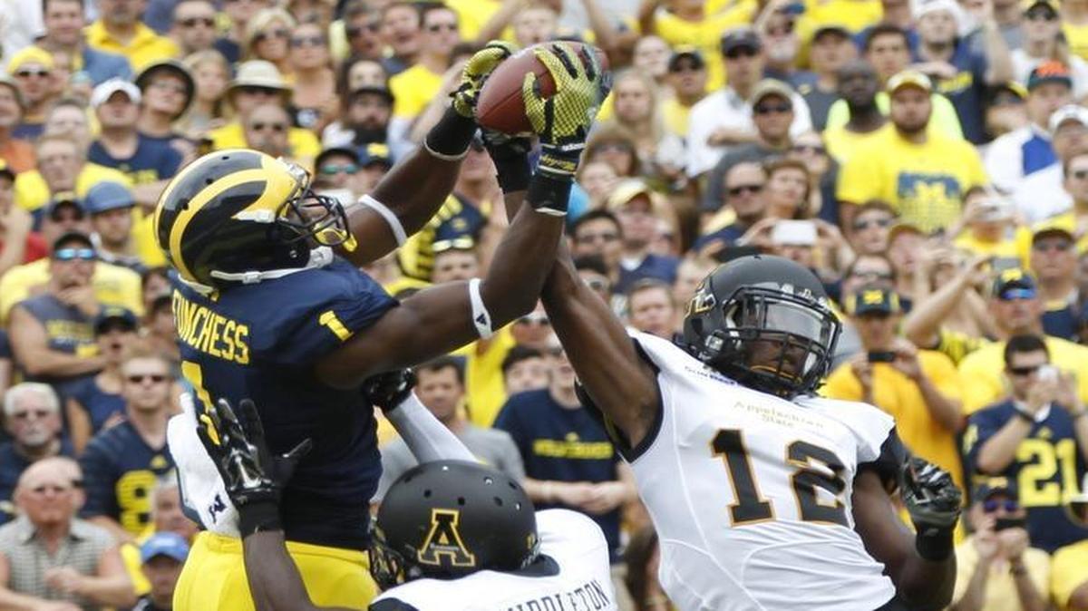 
Michigan’s Devin Funchess outleaps two Appalachian State defenders in 2014 for a touchdown in a 52-14 Michigan win. Funchess was the Panthers’ second-round draft pick in the 2015 NFL draft. 
