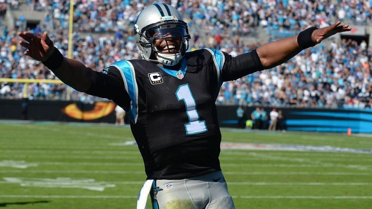 Carolina Panthers quarterback Cam Newton, shown celebrating a touchdown by running back Jonathan Stewart in 2016, turns 28 Thursday.