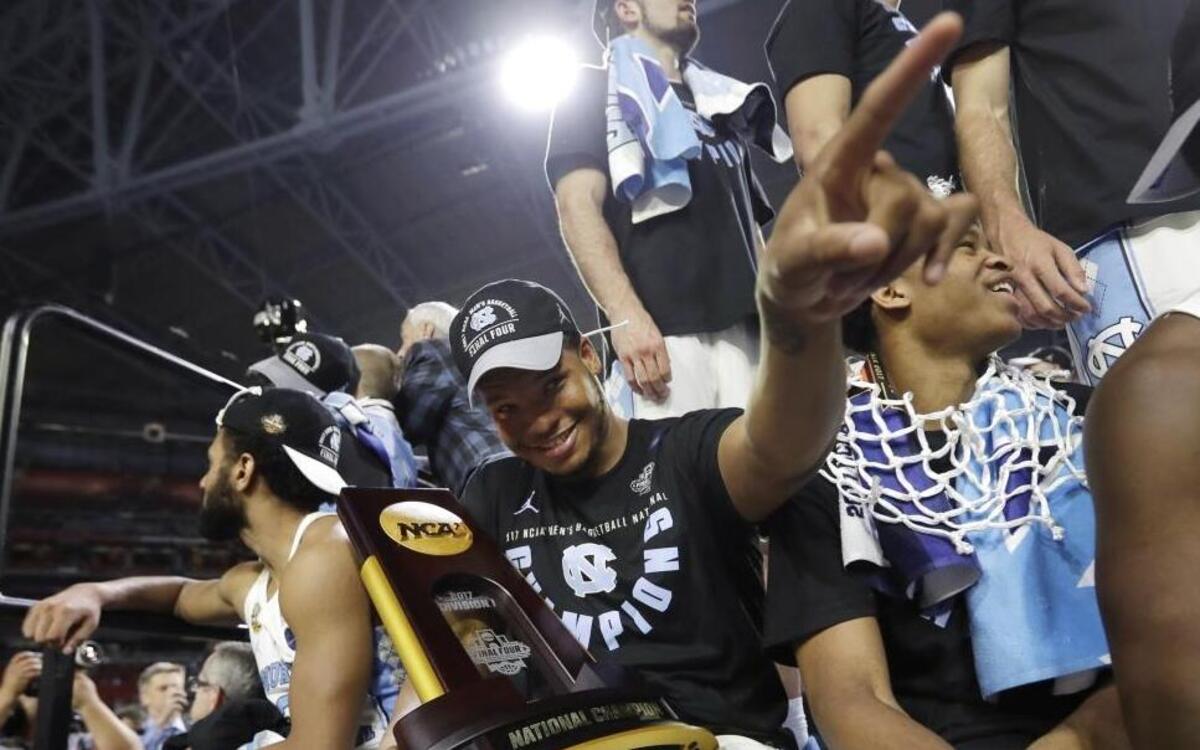 North Carolina forward Kennedy Meeks celebrates with the trophy after the championship game against Gonzaga at the Final Four on Monday.