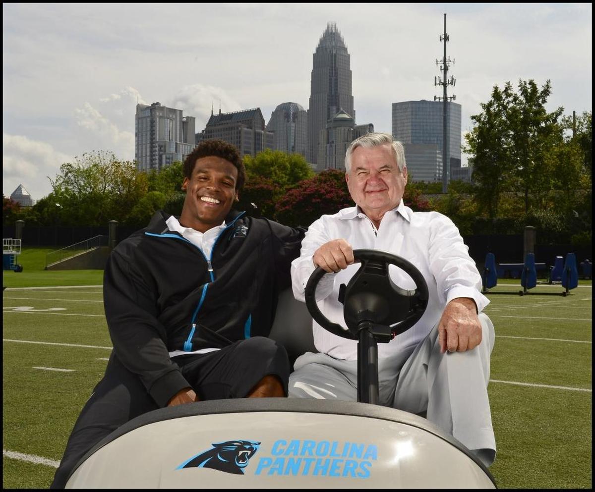 Carolina Panthers quarterback Cam Newton and team owner Jerry Richardson posed for this Observer photo in 2012.