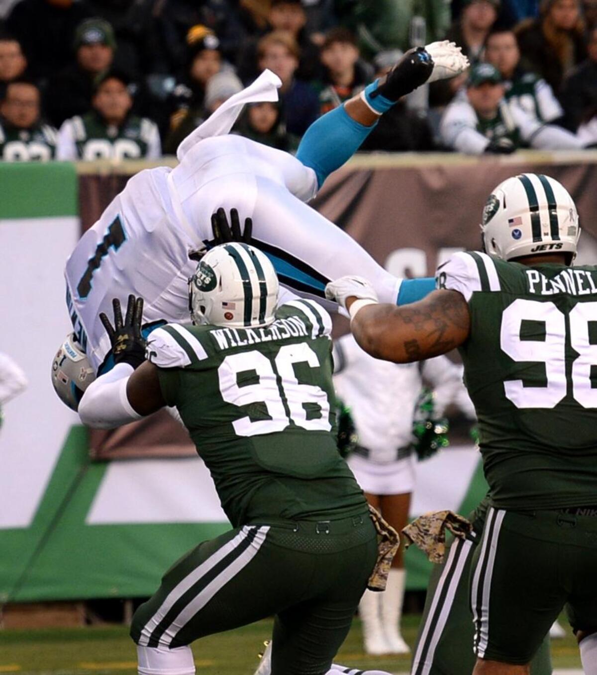 Carolina Panthers quarterback Cam Newton has become much more of a runner again since the first time New Orleans and Carolina met in September. He scored on this two-point conversion against the New York Jets Sunday in a 35-27 win but took a hard hit for his trouble.