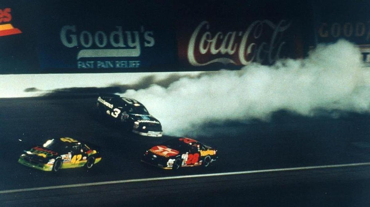 Dale Earnhardt spins on the last lap during The Winston in 1992 as Kyle Petty (42) and Davey Allison (28) speed by.