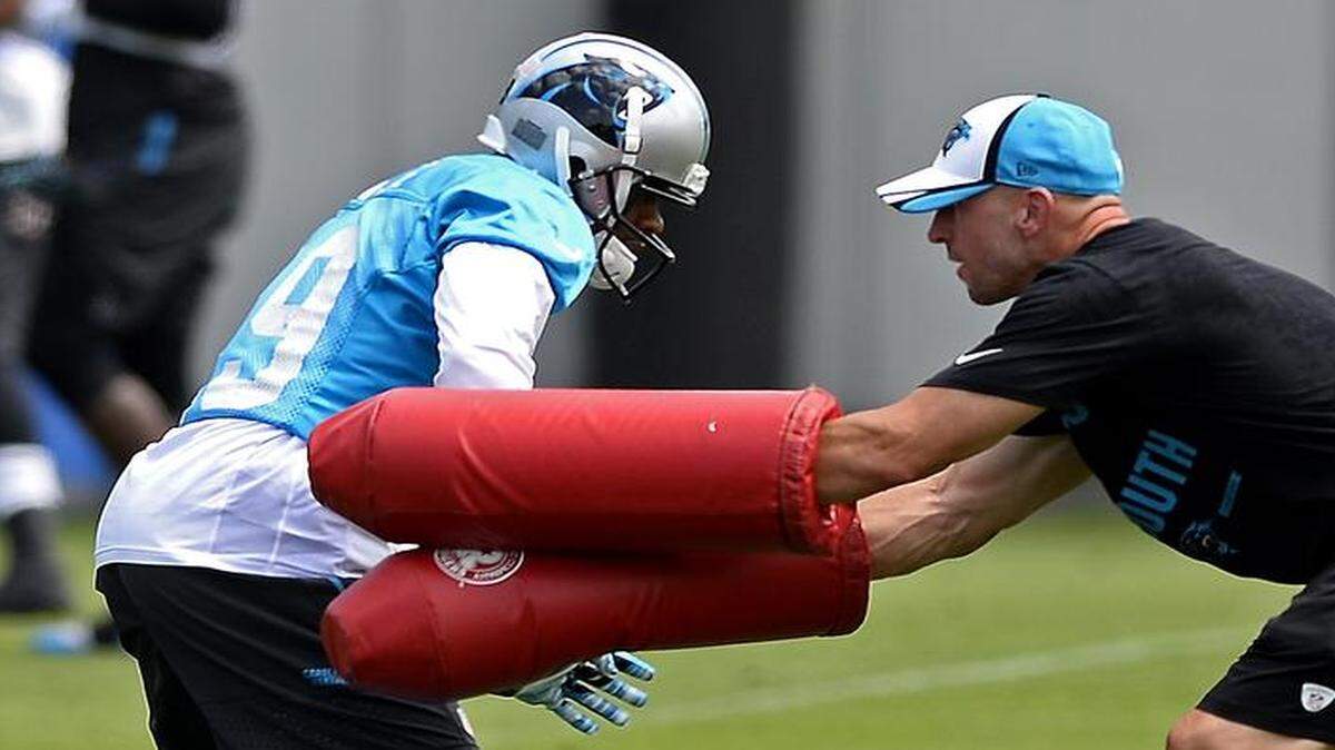 
On of the reasons wide receiver Ted Ginn Jr., left, returned to the Carolina Panthers so quickly when his stay with the Arizona Cardinals didn’t work out was the chance to work again with Panthers wide receivers coach Ricky Proehl (right). 
