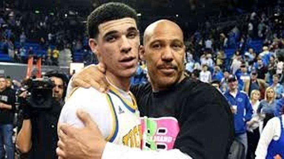 LaVar Ball (right) is unlikely to be fired from his job as the too-talkative father of basketball-playing sons, including top NBA prospect Lonzo Ball (left) of UCLA.