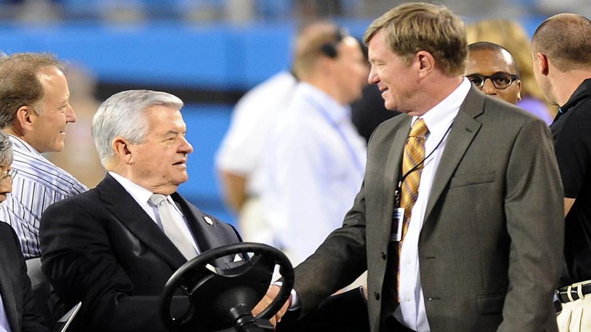 Carolina Panthers owner Jerry Richardson (left) might re-hire Marty Hurney (right) as the team’s general manager, but is it the right move?