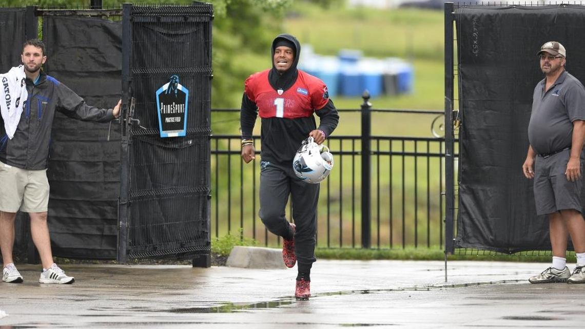 Standing in the rain and watching Carolina Panthers quarterback Cam Newton throw hard passes into a receiver’s hands is not a bad way to start a day. On Tuesday, there was a bonus.