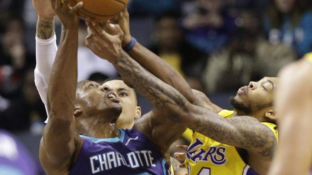 The Los Angeles Lakers' Brandon Ingram, right – 6-9 and 190 pounds –rolled inside against Charlotte to score 18 points and pull down six rebounds.