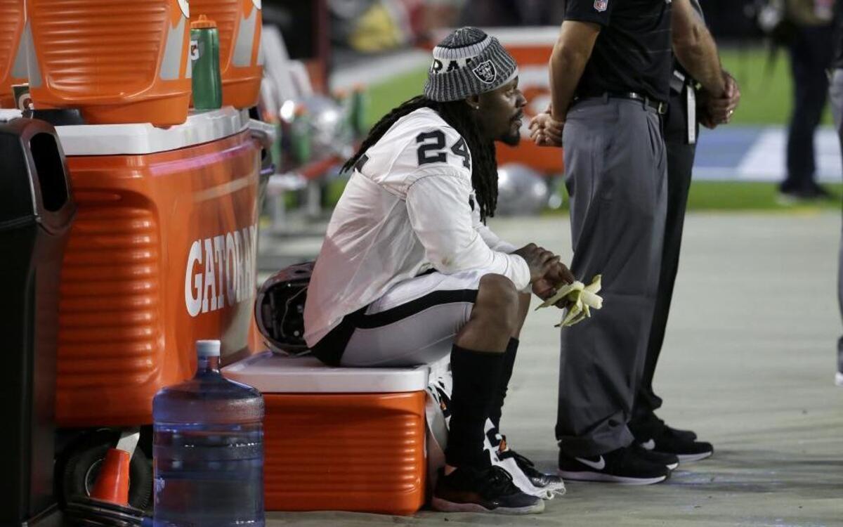 Oakland Raiders running back Marshawn Lynch (24) sat out the national anthem before an NFL exhibition on Saturday, and it created barely a ripple.