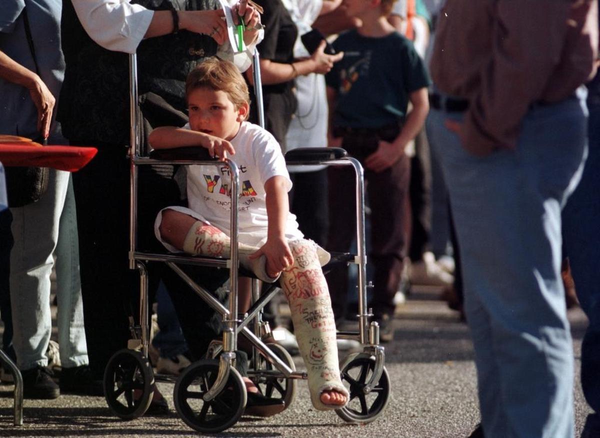 Almost every guy I know was once, or still is, a professional wrestling fan. The appeal is obvious. Above, Hickory’s Tyler Martin, then 5, waits for a chance to see Ric Flair at Charlotte promotion in October 1998. Both Tyler’s legs had been broken in a truck accident earlier that month.