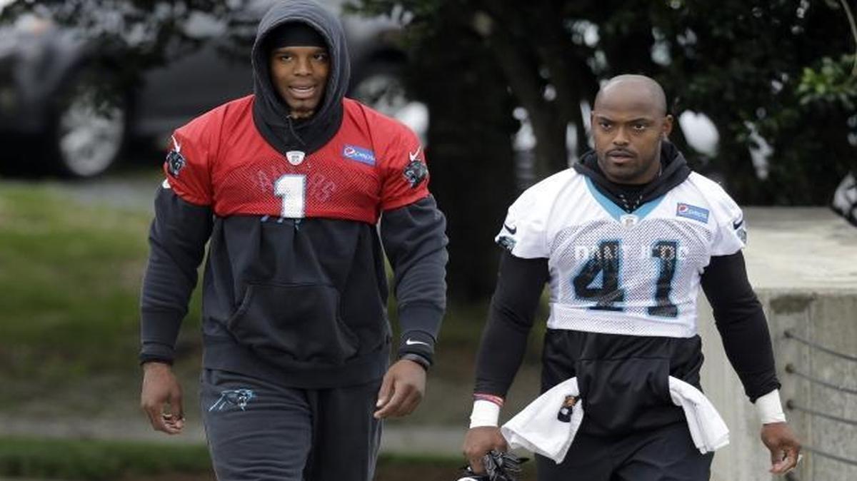 When Carolina Panthers players, from left, Julius Peppers, Cam Newton and Captain Munnerlyn walked to the field on Tuesday, it was if I never left.