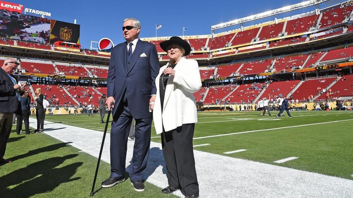 Jerry Richardson and his wife, Rosalind, on the field at Levi’s Stadium in Santa Clara, Calif., before the Carolina Panthers played in Super Bowl 50.