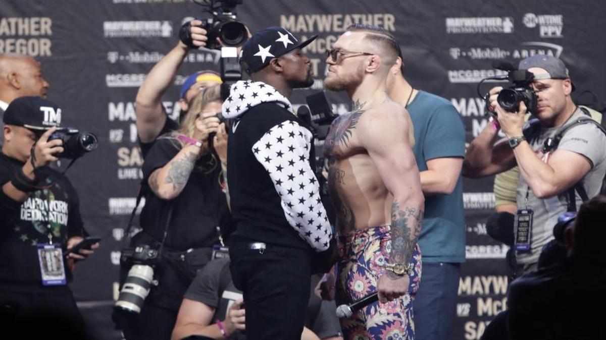Conor McGregor, right, won the press conferences for his fight with Floyd Mayweather Jr., but will he win anything else?