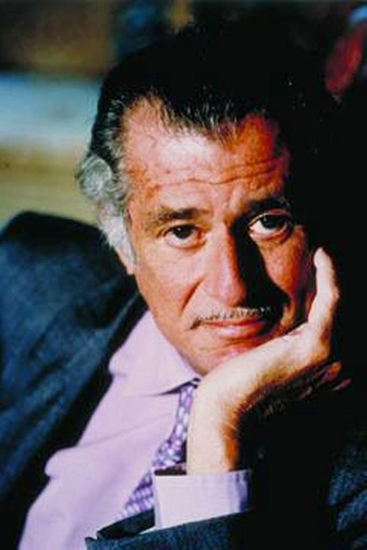 Author Frank DeFord.