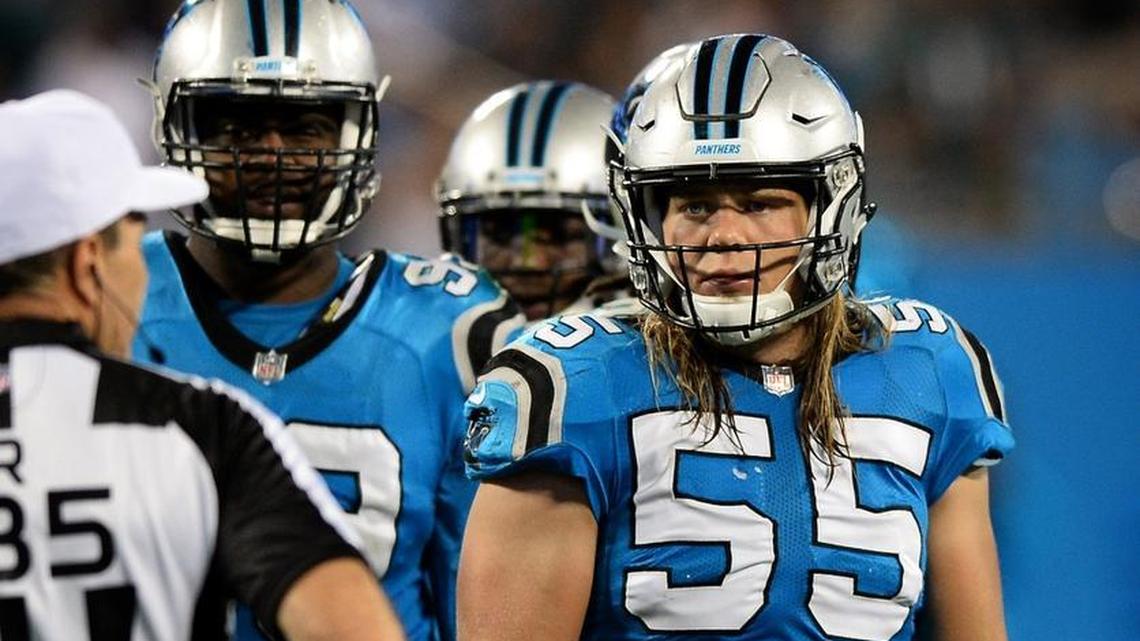 Carolina Panthers linebacker David Mayo’s blond hair once fell past the tops of the dual 55s on his jersey, as in this photo from October. Mayo has donated his hair each time he’s had it cut to a nonprofit that helps children suffering long-term hair loss.
