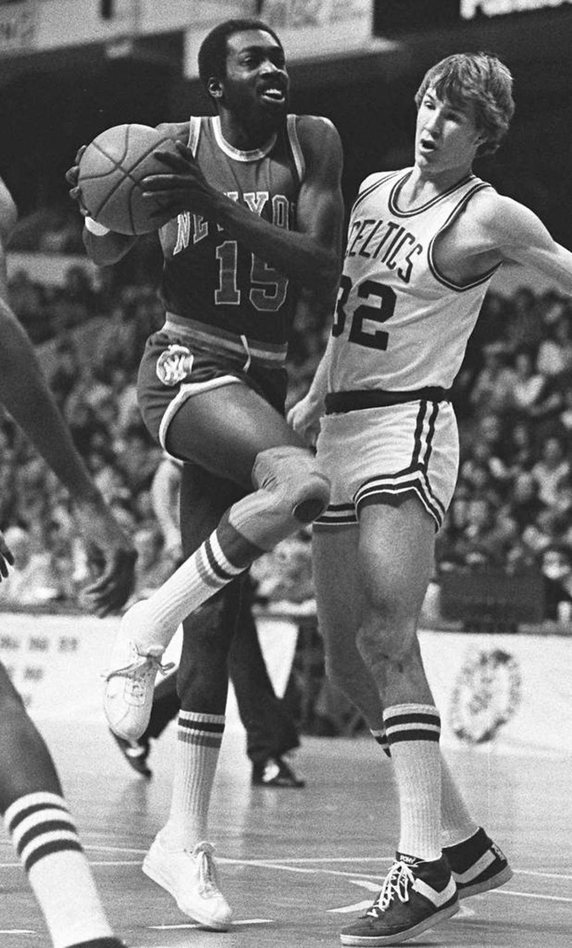 New York Knicks star Earl “The Pearl” Monroe, left, drives against the Boston Celtics’ Jeff Judkins in Boston in this Feb. 11, 1979 photo.