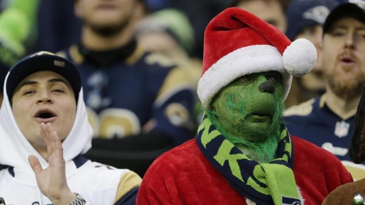 I had one really dumb loss last week. I picked the Seattle Seahawks to beat the Los Angeles Rams. The game is in Seattle, the stadium and fans, like the one at right, make winning difficult for visitors, and the Seahawks have to win. But the Seattle team I picked stopped playing in 2013.