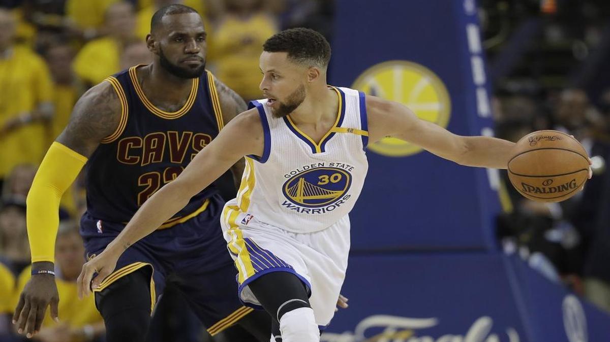 Golden State Warriors guard Stephen Curry (30) is hard to contain – and hard to beat. So far the Cleveland Cavaliers and forward LeBron James have been unable to do either.