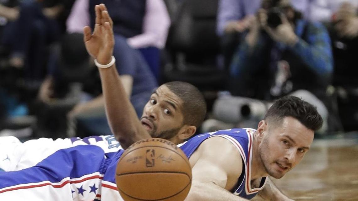 It will take more than one good player for the Charlotte Hornets to become a top four team in the NBA East. Above, Nicolas Batum and Philadelphia 76ers’ JJ Redick, front, chase a loose ball.