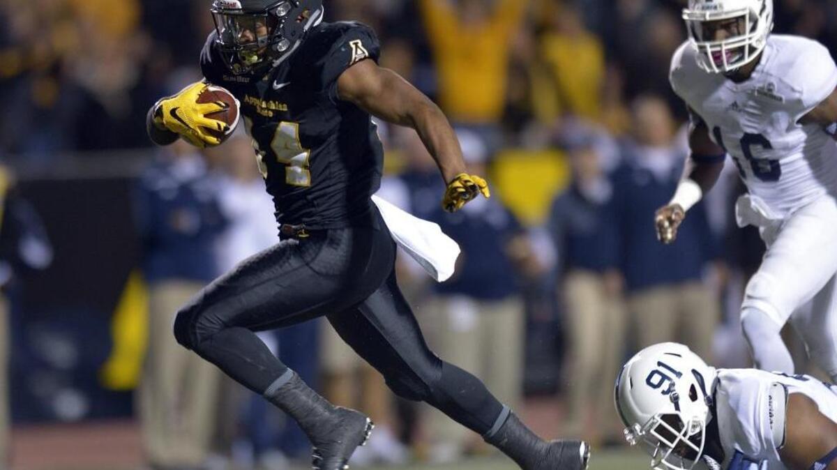Appalachian State running back Marcus Cox (14) will find a way in the NFL, just as he has at every other level of football.
