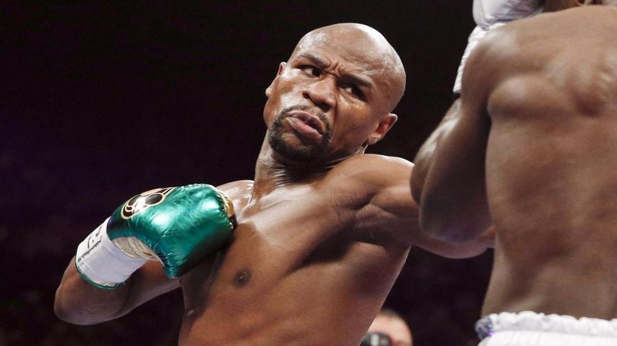 If Floyd Mayweather Jr. (left) boxes MMA fighter Conor McGregor, it’s no contest.
