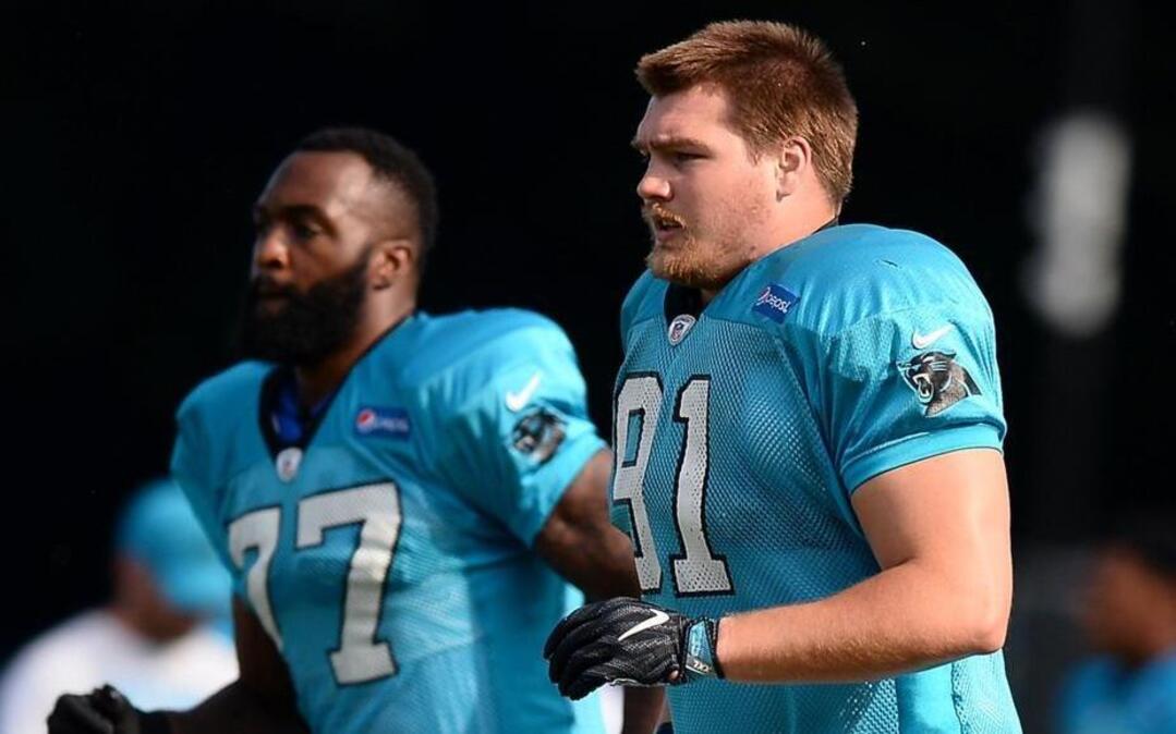 Carolina Panthers defensive tackle Drew Iddings, right, is a very large man, but that’s only half the story.