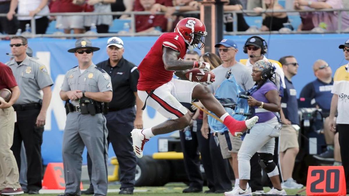 N.C. State and Jaylen Samuels (1) played a thrilling game in Charlotte against South Carolina to open the college football season, but there was one reason for disappointment.