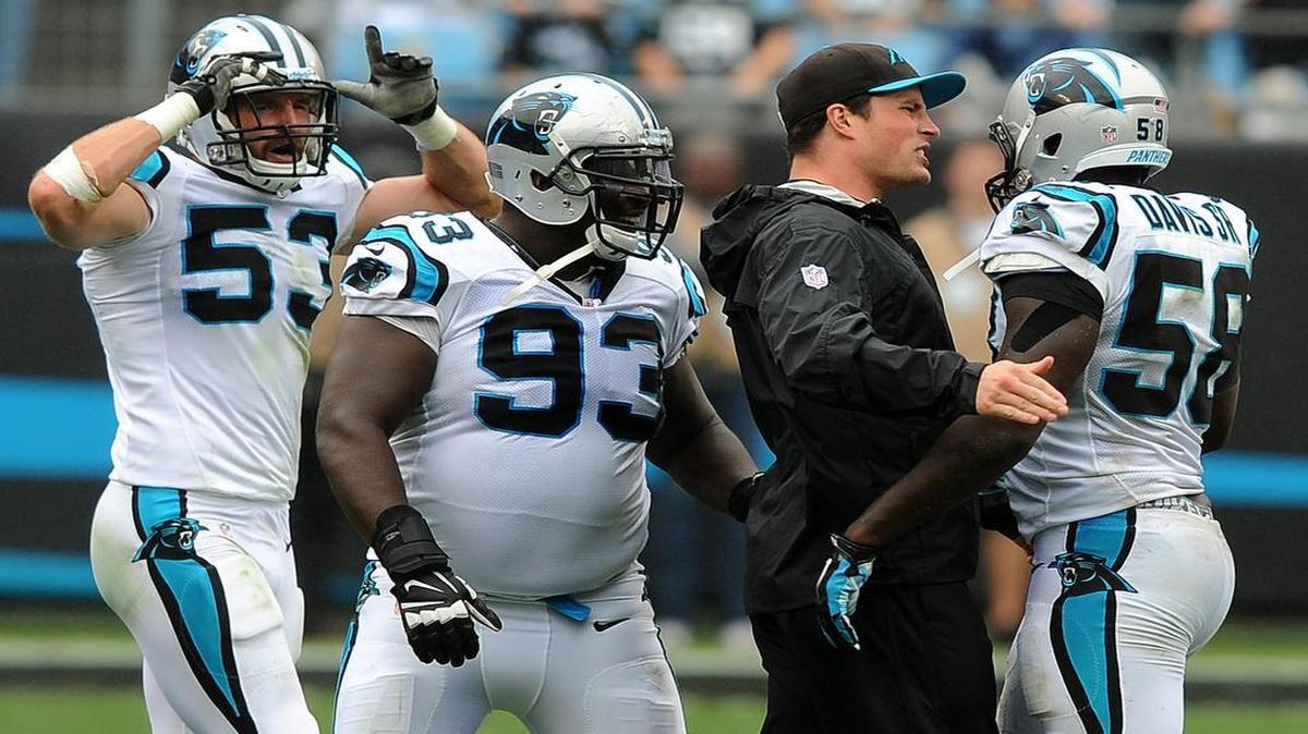 
(L-R) Carolina Panthers linebacker Ben Jacobs, defensive tackle Kyle Love, linebacker Luke Kuechly congratulate linebacker Thomas Davis on a play vs the New Orleans Saints during fourth quarter action on Sunday, September 27, 2015 at Bank of America Stadium in Charlotte, NC. The Panthers defeated the Saints 27-22.
