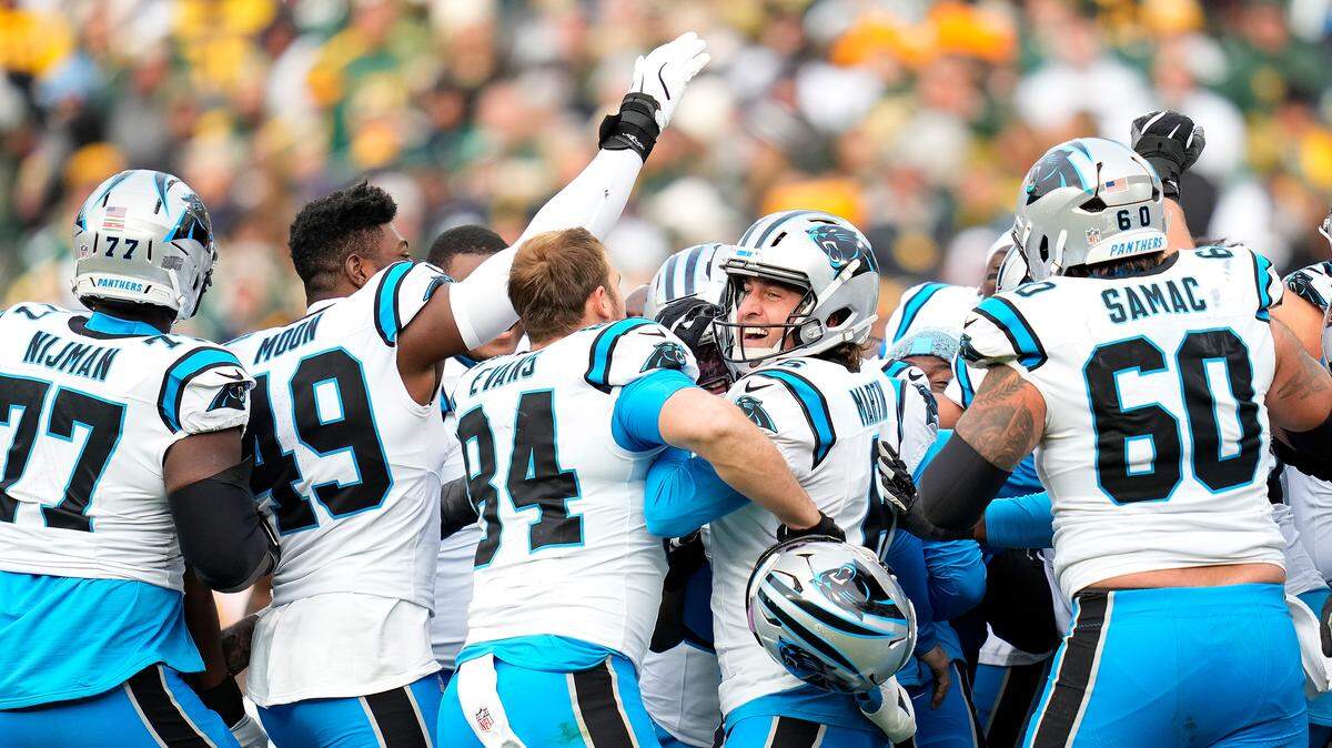 GREEN BAY, WISCONSIN - NOVEMBER 02: Ryan Fitzgerald #10 of the Carolina Panthers celebrates with teammates after kicking the game winning field goal during the fourth quarter in the game at Lambeau Field on November 02, 2025 in Green Bay, Wisconsin. (Photo by John Fisher/Getty Images)