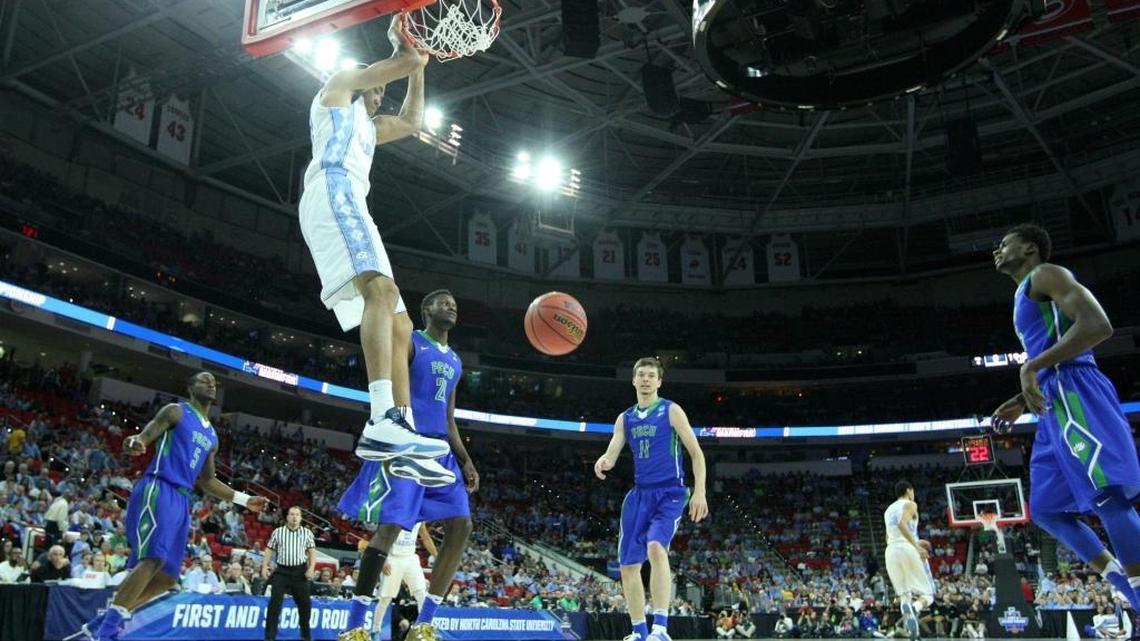 North Carolina's Brice Johnson slams in two during the first half of UNC's game against Florida Gulf Coast in the first round of the NCAA Division I Men's Basketball Championship at PNC Arena in Raleigh in March.