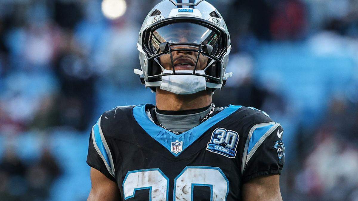 Panthers runningback Chuba Hubbard looks up at the video board during a timeout in the game against the Cardinals at Bank of America Stadium in Charlotte, NC on Sunday, December 22, 2024.
