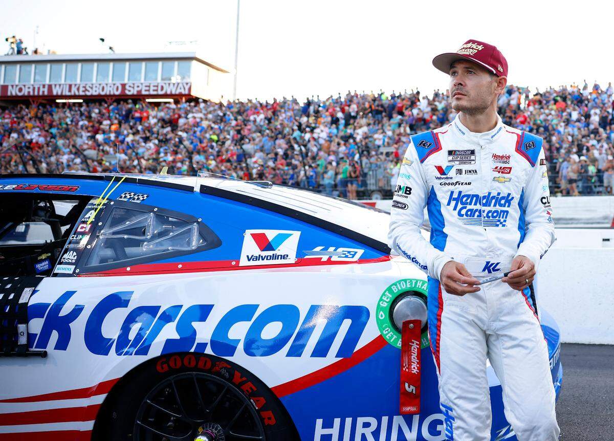 NASCAR Cup Series driver Kyle Larson stands next to his car prior to competing in the NASCAR All-Star race at North Wilkesboro Speedway in North Wilkesboro, NC on Sunday, May 19, 2024. Larson had earlier qualified fifth for the Indianapolis 500.