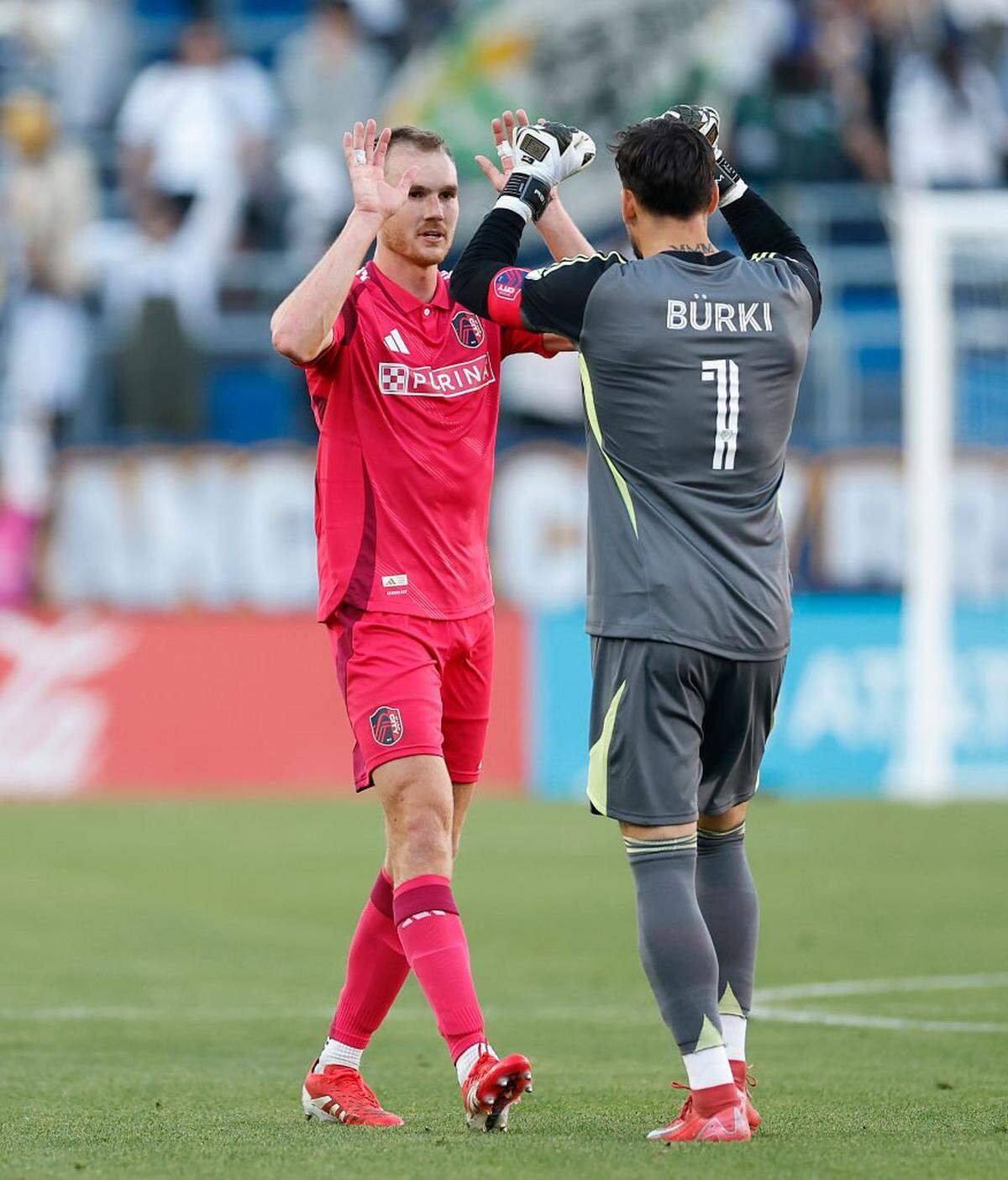 CARSON, CALIFORNIA - MARCH 09: Henry Kessler #5 and Roman BÃ¼rki #1 of St. Louis City celebrate a 3-0 win against the Los Angeles Galaxy in the second half at Dignity Health Sports Park on March 09, 2025 in Carson, California. (Photo by Ronald Martinez/Getty Images)