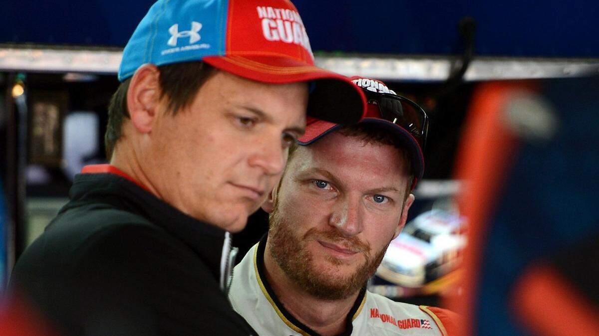 NASCAR Sprint Cup Series crew chief Steve Letarte, left, and driver Dale Earnhardt Jr. watch members of the team make adjustments to the car following practice at Charlotte Motor Speedway in Concord, N.C., on Saturday, May 24, 2014. The Coca-Cola 600 is scheduled Sunday. (Jeff Siner/Charlotte Observer/MCT)