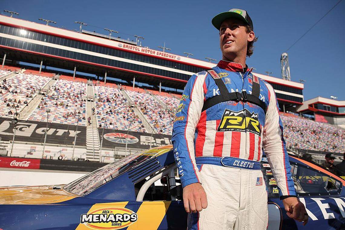 Garrett Mitchell, also known as Cleetus McFarland, driver of the No. 30 Kenetik Ford waits on the grid prior to the ARCA Menards Series Bush's Beans 200 at Bristol Motor Speedway on Sept. 11, 2025, in Bristol, Tennessee.
