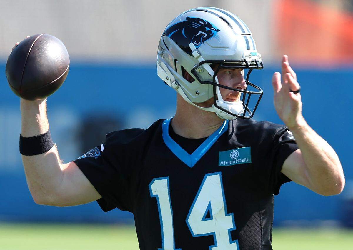 Carolina Panthers quarterback Andy Dalton drops back to pass to a receiver during a training camp practice on Wednesday, July 23, 2025. 