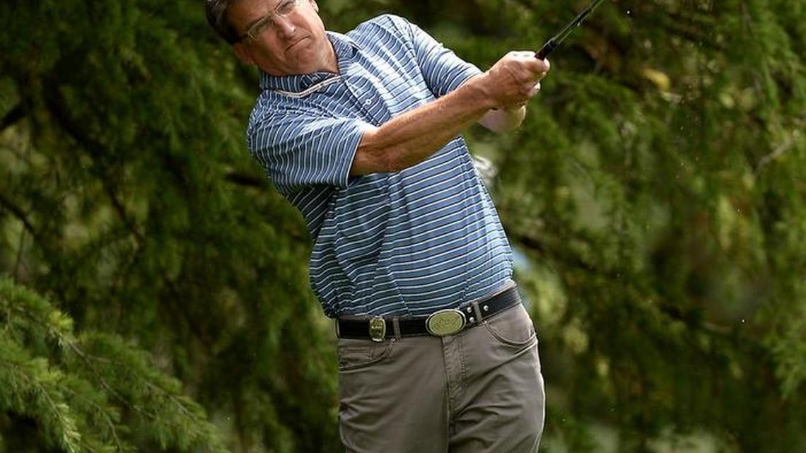 North Carolina Governor Pat McCrory chips onto the 15th green during a Pro-Am at Quail Hollow Club in Charlotte, NC on Wednesday, May 4, 2016. McCrory played with Felix Sabates and professional golfer Rickie Fowler.